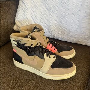 Jordan 1’s High-Top Sneakers in Beige and Black with Pink Accent